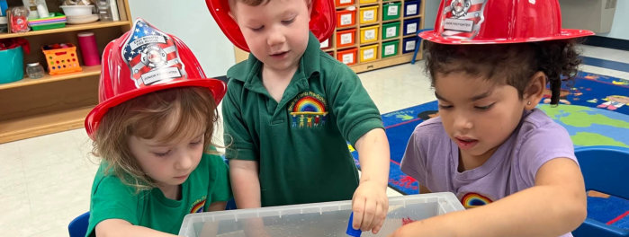 kids playing as a firefighters